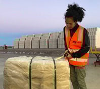 labour worker unpacking shipment