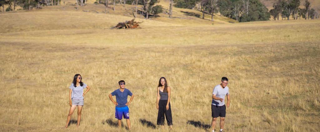 Farm workers developing careers in agriculture through practical field work