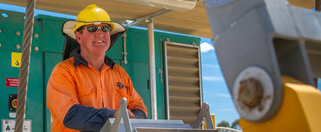 Farm workers using personal protective equipment during agricultural work